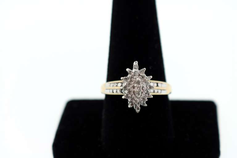 Rising Diamond Cluster 10k Gold Ring with Channel Set Diamonds