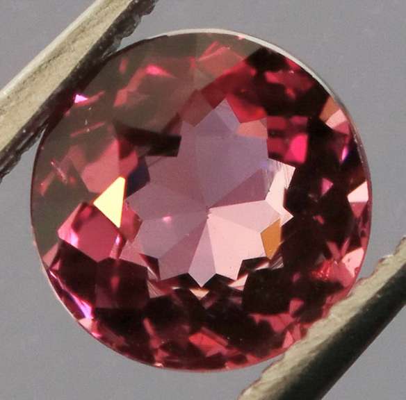 Ravishing .83ct rich violet pink Rhodolite Garnet solitaire