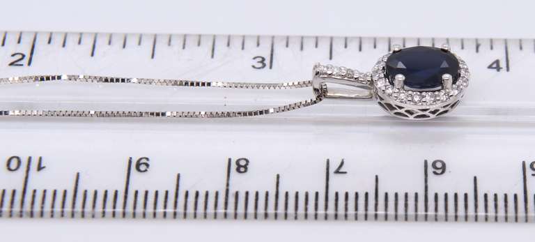 Shimmering Blue Sapphire and Diamond Pendant on Chain