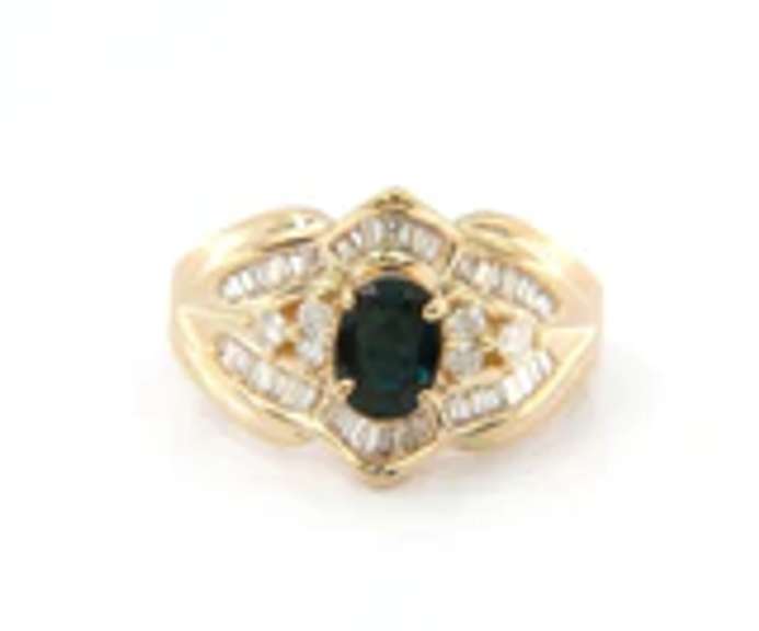 Handsome Yellow Gold oval Sapphire and Baguette Diamond Ring