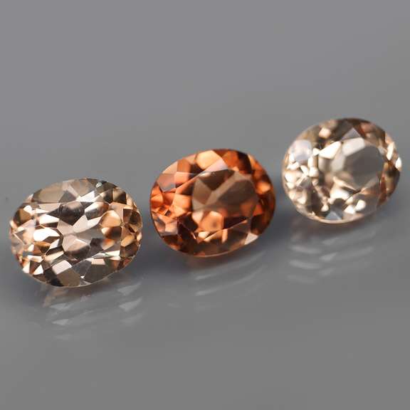 Matched! 3 piece 12.54ct full fire Imperial Topaz set