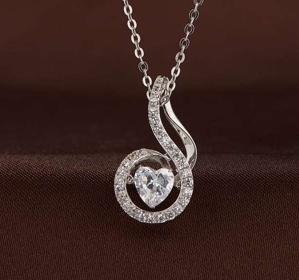 Gorgeous heart shape Center Dancing Stone Pendant