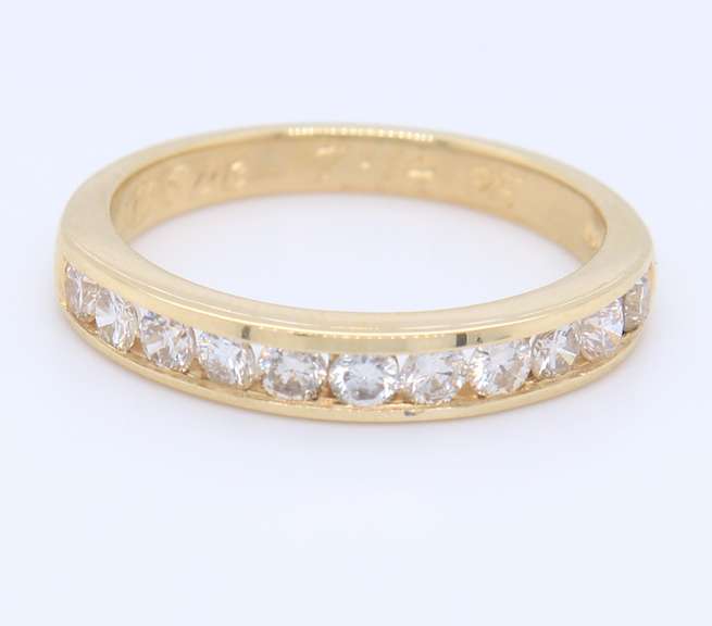 Stunning Yellow Gold Channel Set Diamond Band