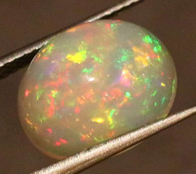 Glowing! 4.63ct full cover multi-pattern Jelly Opal