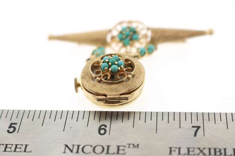 14 KT GENEVA WATCH PIN WITH TURQUOISE ACCENTS