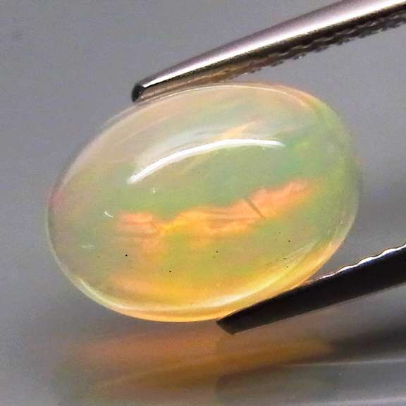 Glowing! 2.45ct full cover multi-pattern Jelly Opal