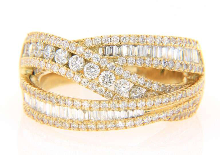 Dramatic Yellow Gold Round and Baguette Diamond Crossover Ring