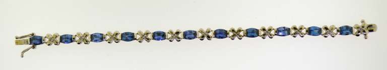 Sterling Silver XO Blue Stone Bracelet