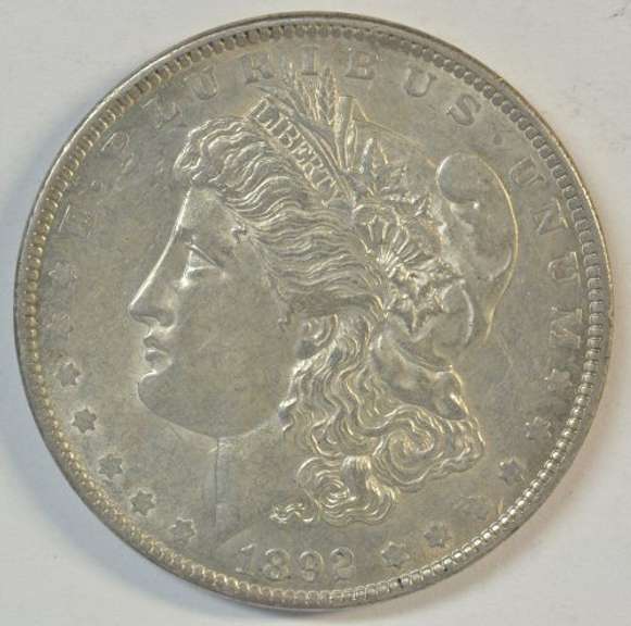 Creamy-white nearly BU 1892-P Morgan Silver Dollar. Scarce