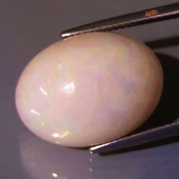 Substantial 13.95ct semi-black Welo Opal