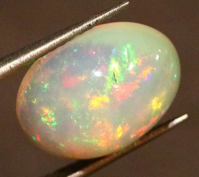 Vibrant 3.27ct lunar flashing Welo Opal