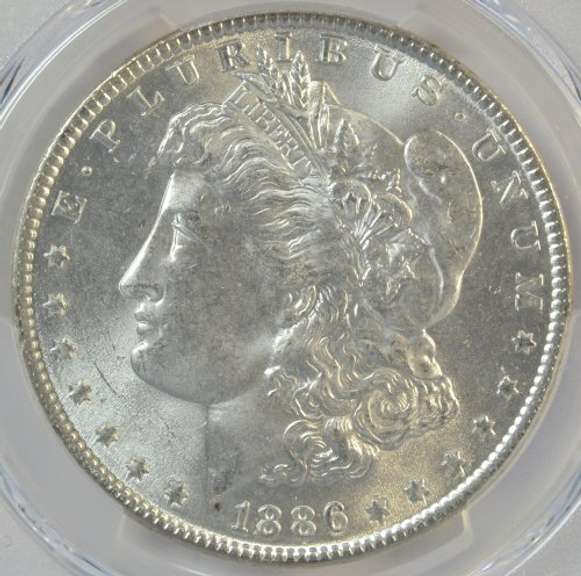 Basically Gem BU 1886 Morgan Silver Dollar. PCGS MS64