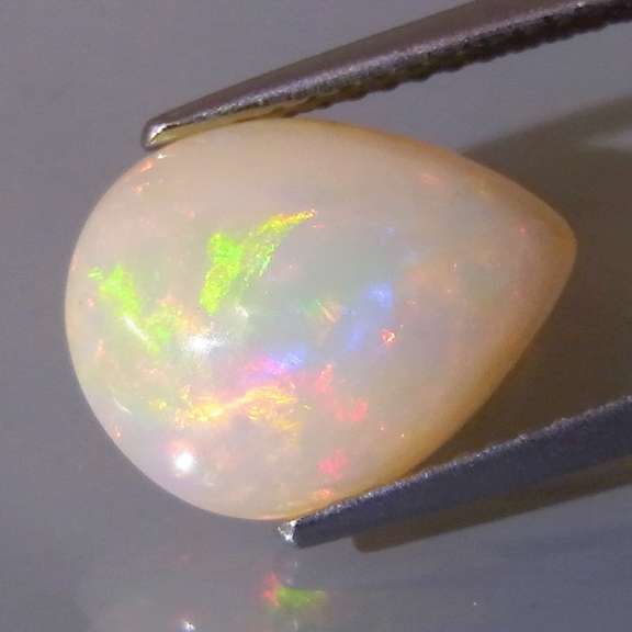 Brilliant flashing 2.62ct semi-black Opal