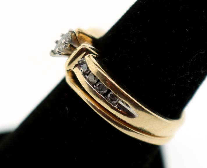Shiny 10k Gold Oval Diamond Ring Flanked with Baguette Diamonds