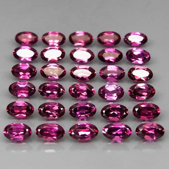 Ravishing 8.51ct violet pink Rhodolite Garnet set