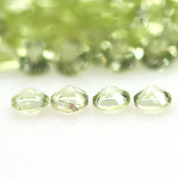 Real 5.69ct untreated apple green Peridot set