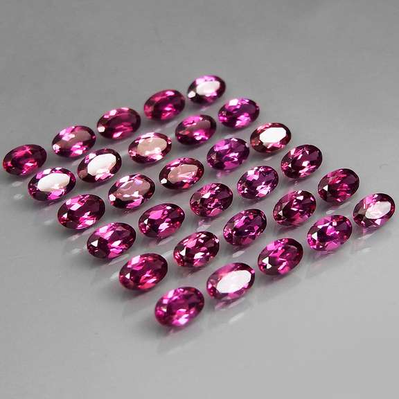 Ravishing 8.51ct violet pink Rhodolite Garnet set