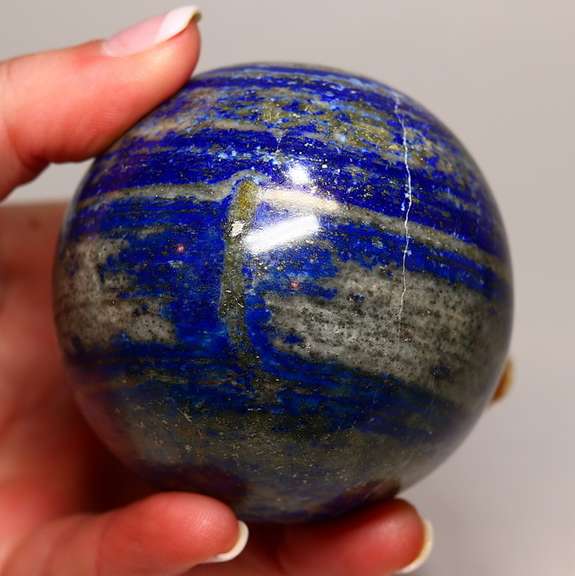 Eye catching 1.2 pound bullseye Lapis sphere