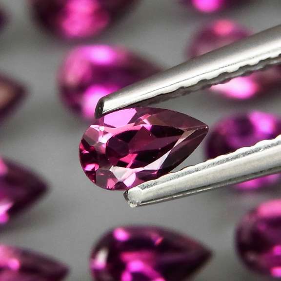 Ravishing 7.55ct violet pink Rhodolite Garnet set