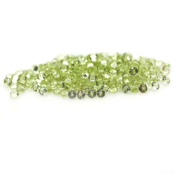Real 5.69ct untreated apple green Peridot set
