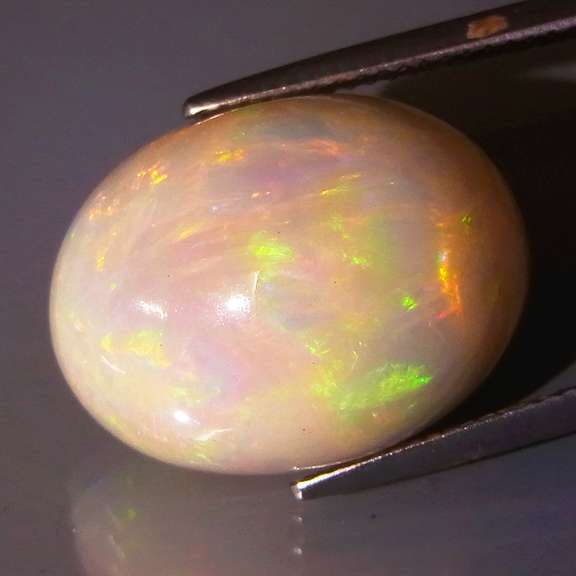 Huge 14.85ct full body flashing Welo Opal