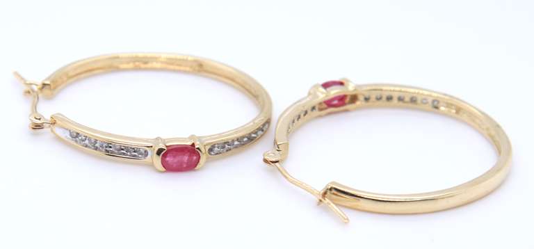 Charming Yellow Gold oval Ruby & Diamond Hoop Earrings