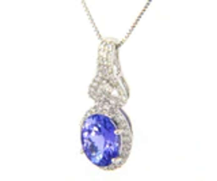 Romantic White Gold oval Tanzanite and Diamond Pendant