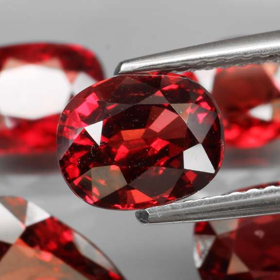 Mixed cut 11.69ct premium cherry red Pyrope garnet