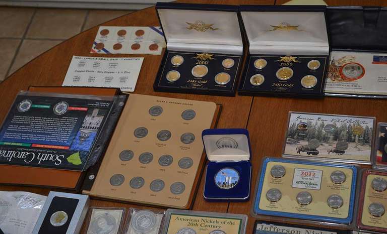 Lot Of Collectible Coins And Displays.