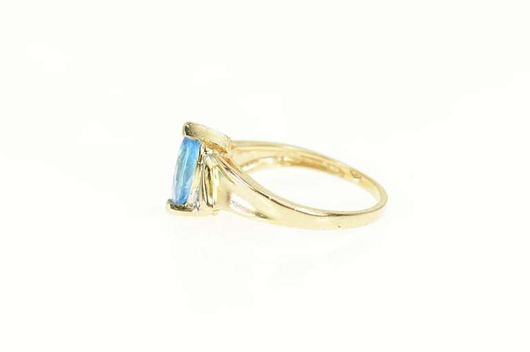 10K Yellow Gold Marquise Blue Topaz Diamond Accent Ring