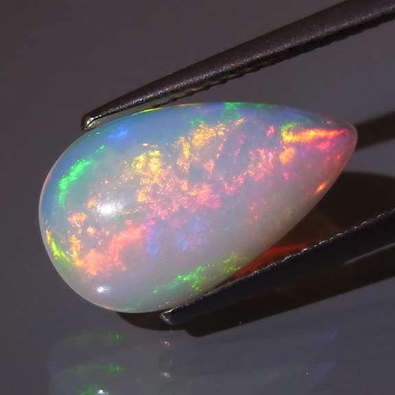 Captivating 2.95ct rainbow honeycomb flashing Opal