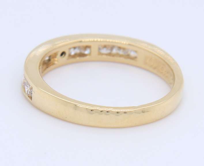Stunning Yellow Gold Channel Set Diamond Band