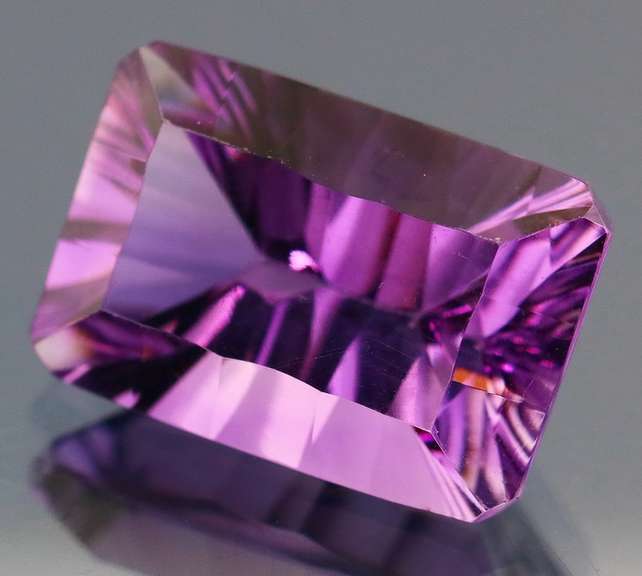 Superb 13.31ct concave emerald cut Bolivian Amethyst