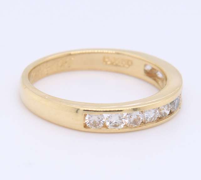 Stunning Yellow Gold Channel Set Diamond Band