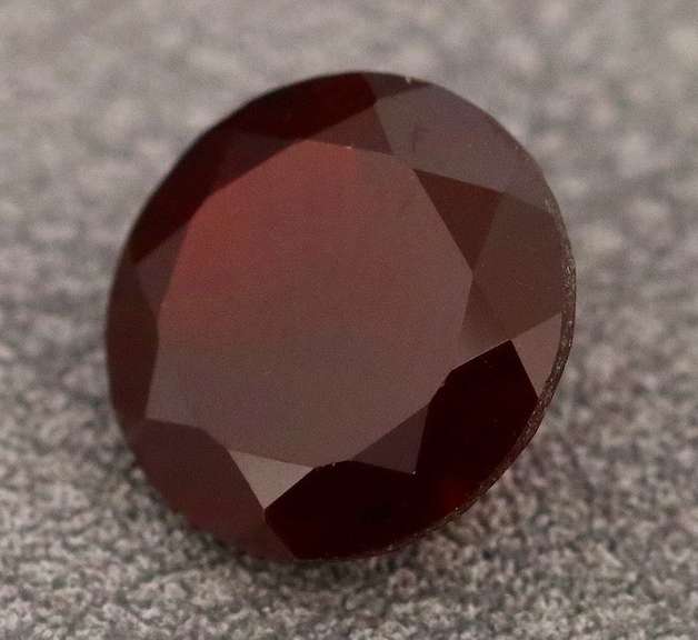 Ravishing 4ct black cherry red Mozambique Garnet solitaire