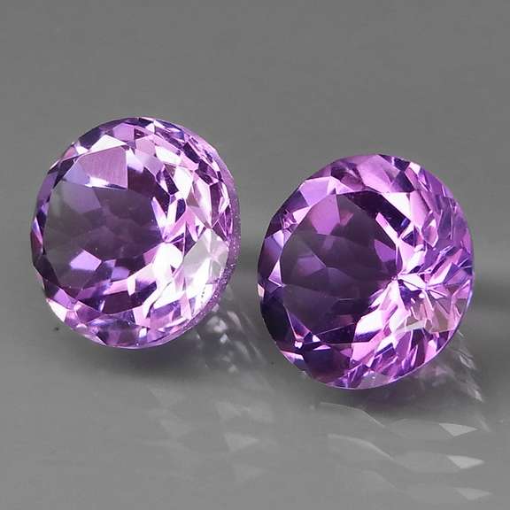 Glittering 7.35ct round cut Bolivian Amethyst set