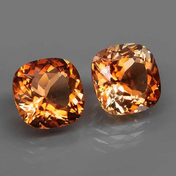 Gorgeous cushion cut 10.47ct Imperial Topaz set