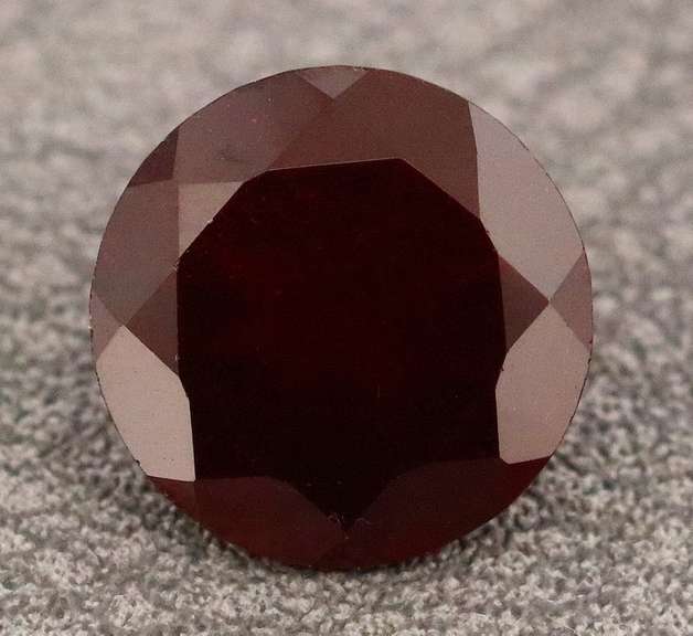 Ravishing 4ct black cherry red Mozambique Garnet solitaire