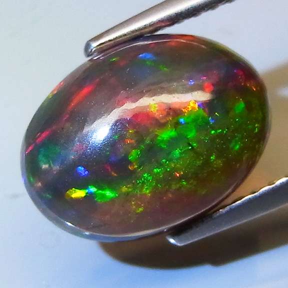 Rainbow multi flashing 2.45ct Welo Black Opal!