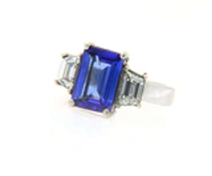Quintessential Emerald Cut Tanzanite and Trapezoid Diamond Ring