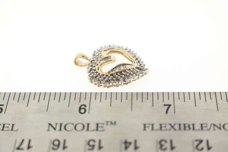 10k Gold Contemporary Heart Pendant Studded with Diamonds
