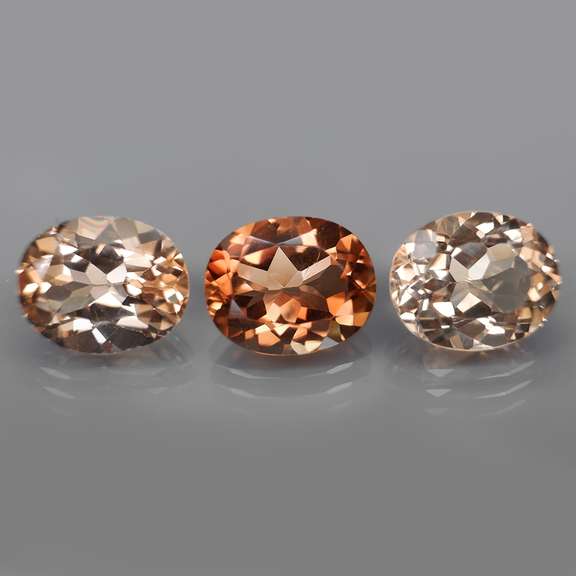 Matched! 3 piece 12.54ct full fire Imperial Topaz set