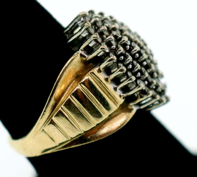 Enrapturing Oval Diamond Cluster Ring with 10k Gold