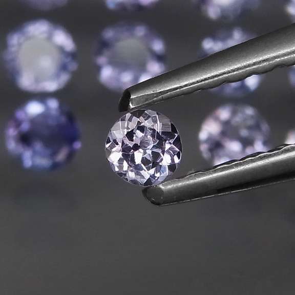 Glittering 3.64ct bright blue violet Tanzanite set