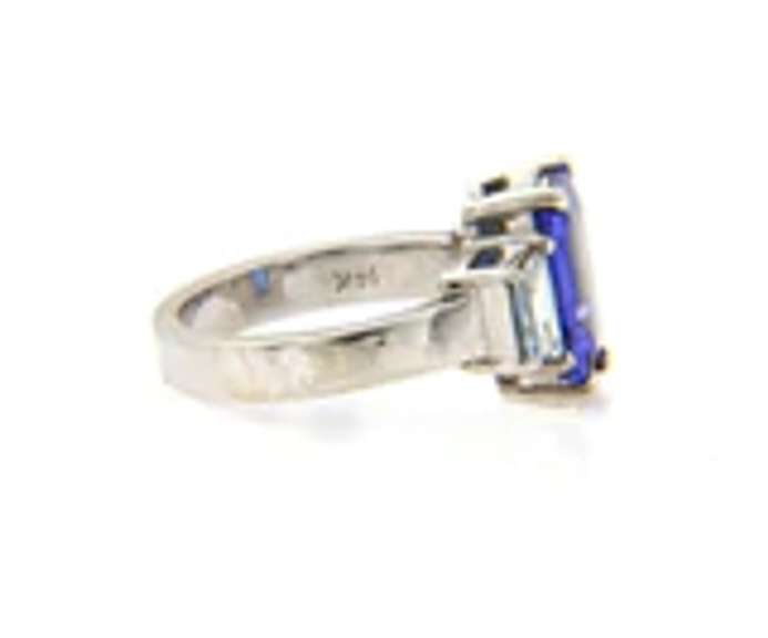 Quintessential Emerald Cut Tanzanite and Trapezoid Diamond Ring