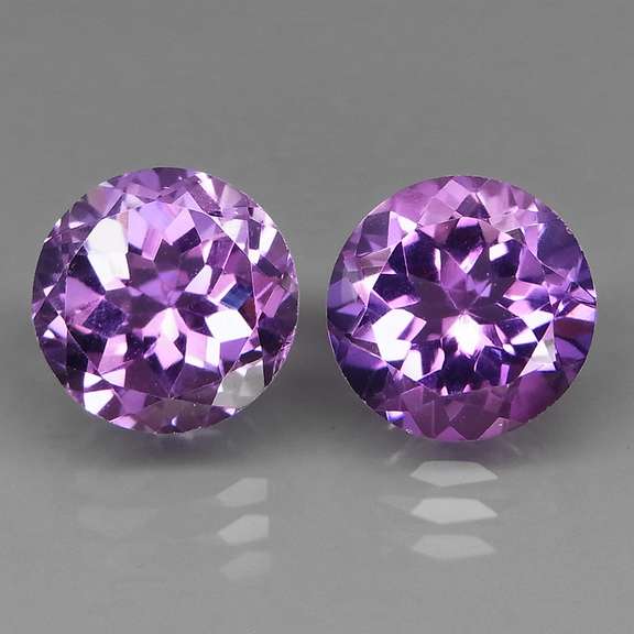 Glittering 7.35ct round cut Bolivian Amethyst set