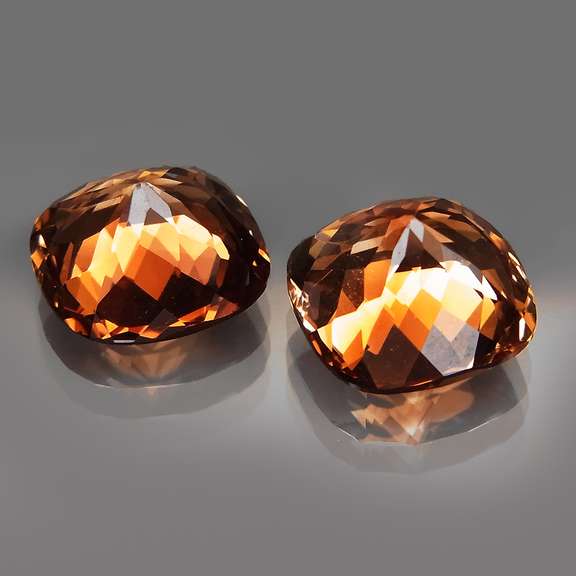 Gorgeous cushion cut 10.47ct Imperial Topaz set