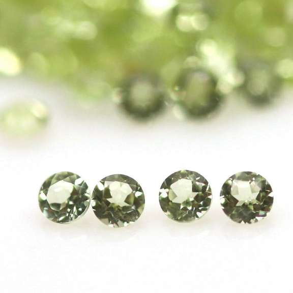 Real 5.69ct untreated apple green Peridot set
