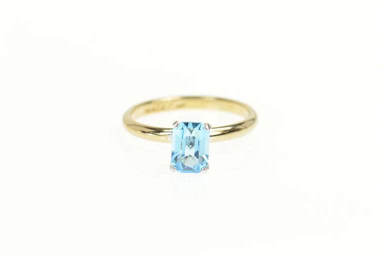 Gold Plated Sim. Emerald Cut Blue Topaz Solitaire Ring