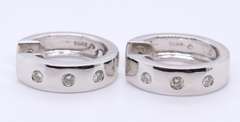 Attractive White Gold 3 Stone Diamond oval Huggies